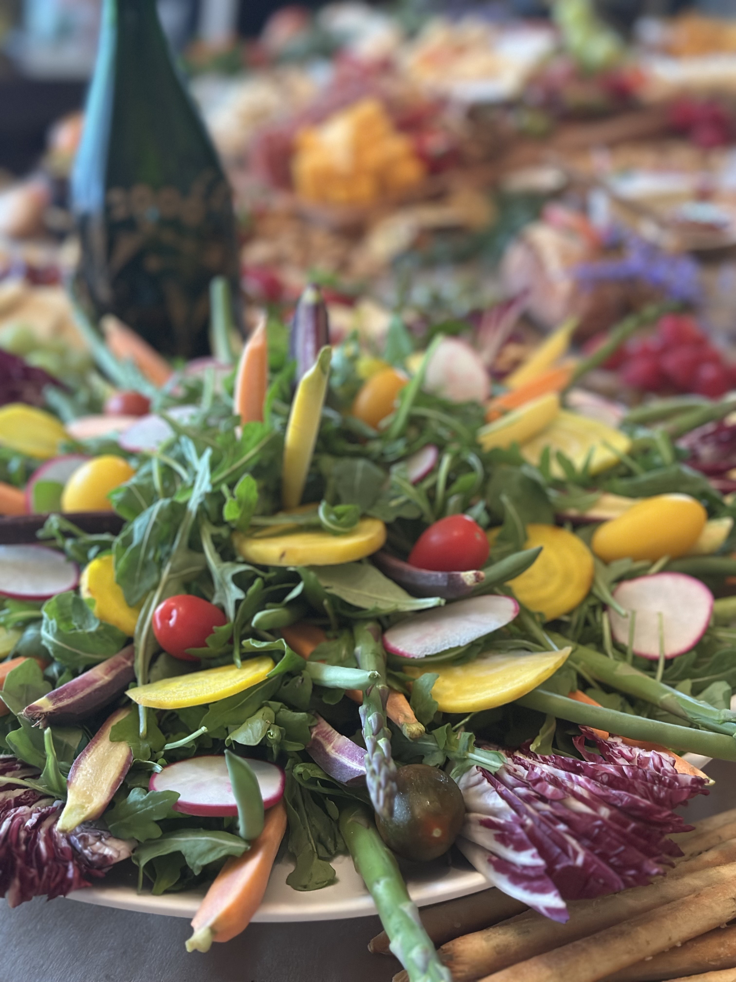 Fresh vegetable platter with greens and seasonal vegetables